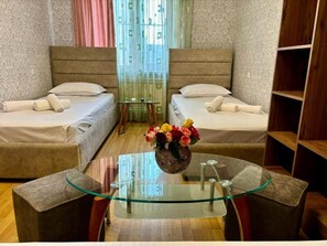 Standard Twin Room, Courtyard View | Desk, laptop workspace, soundproofing, iron/ironing board