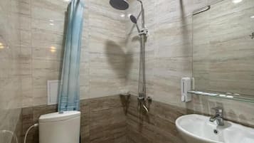 Standard Twin Room, Courtyard View | Bathroom | Free toiletries, hair dryer, slippers, towels