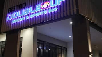 A building with a sign that reads 'BISTRO DOUBLEUP Bistro & Sports Bar.'