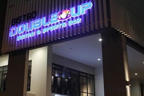 A building with a sign that reads 'BISTRO DOUBLEUP Bistro & Sports Bar.' - Lily & Loft - The Grand Sofo, Petaling Jaya (Petaling Jaya)