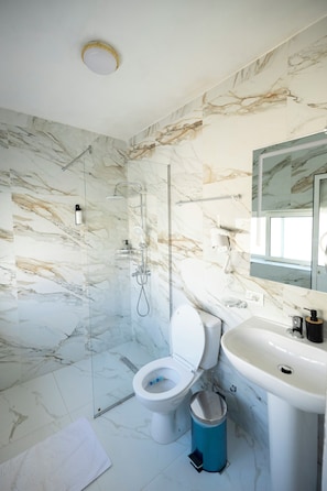 Comfort Double Room, City View | Bathroom | Shower, hair dryer, towels, soap