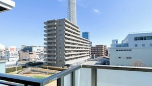 A modern building with multiple floors and a unique tower-like structure. - LAFESTA Higashi Komagata　 (Tokyo)