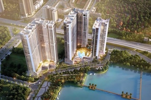 A high-rise residential building complex with multiple towers, a central courtyard, and a surrounding body of water. - Vinhomes Skylake Residence Hanoi City - Mango Housing (Hanoi)