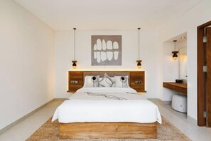 A modern bedroom with a wooden bed frame, a large wall-mounted artwork, and a bedside table with a mirror. - Villa Ubud Escape by BaliSuperHost (Bali)
