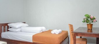 Amor Homestay near Eltari International Airport Mitra RedDoorz