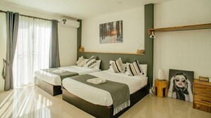 A modern hotel room with two beds, a large window with curtains, a painting on the wall, and a wooden sideboard. - Private Pool Villa 6 Bedroom - Cloud Nine Villa (Chiang Mai)