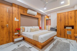 Ropa de cama de alta calidad, minibar y escritorio 