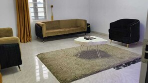 Apartamento família | Sala de estar