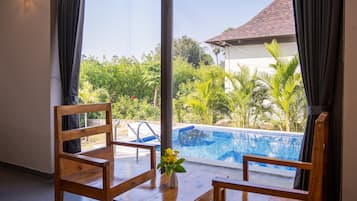 Chambre Double Deluxe | Coin séjour