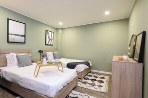 1 غرفة نوم ومكواة/لوح كي وواي فاي وملاءات أسرّة