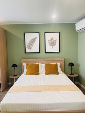 1 غرفة نوم ومكواة/لوح كي وواي فاي وملاءات أسرّة