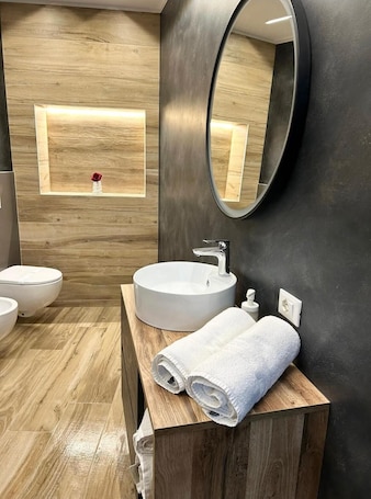 Hair dryer, towels, soap, toilet paper. Junior Suite with In-Room Jacuzzi