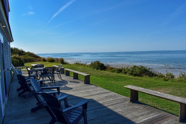 Outdoor dining - Rustic Oceanfront Retreat with Private Beach and Expansive Deck (Dennis)