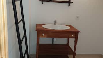 Shower, towels, soap, toilet paper