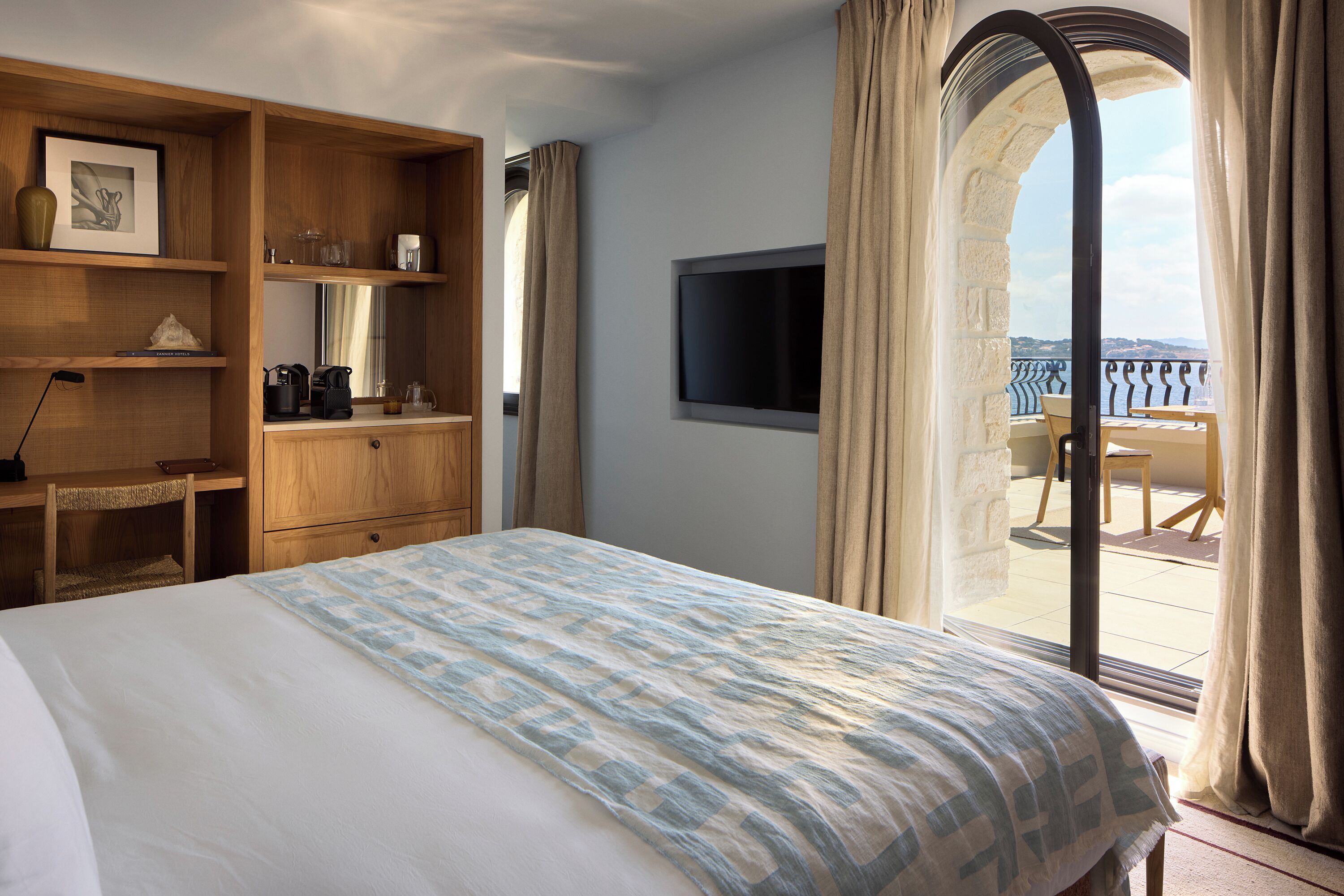 Delos Solea Suite | In-room safe, blackout drapes, iron/ironing board, free WiFi