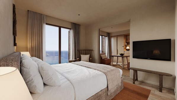A hotel room with a large bed, a TV, a desk, and a view of the ocean. - Zannier Île de Bendor (Bandol)