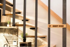 A staircase with a sign indicating a guest room. - 11-Min Walk to Sensoji! Modern x Traditional House in Asakusa, 1 Min to Shopping street (Tokyo)