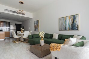 Luxury Apartment, 3 Bedrooms, Private Pool, City View | Living area | 43-inch Smart TV with digital channels, Netflix, streaming services - SIMPLY COMFORT Chic 3 Br Apartment with Private Pool (Dubai)