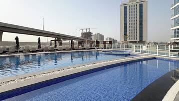 Outdoor pool, pool umbrellas, pool loungers