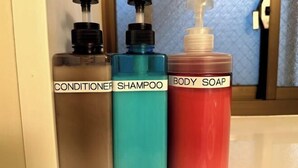 Three bottles of liquid soap labeled conditioner, shampoo, and body soap. - Nakano5chome-102 (Tokyo)
