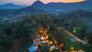 An aerial view of a resort with multiple tents and a circular driveway. - CAMP Ta Torn Yorn (Mae On)