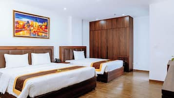 Family Triple Room, City View | Desk, laptop workspace, free WiFi