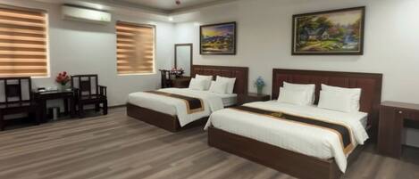 Family Quadruple Room, City View | Desk, laptop workspace, free WiFi
