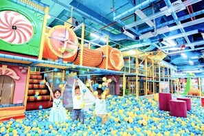 An indoor play area with a ball pit, climbing structures, and colorful play equipment. - Flora Urban - Premium Apartment Vinhomes Skylake Near Keangnam (Hanoi)