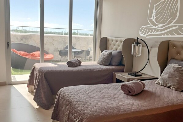 2 عدّة غرف نوم وخزنة داخل الغرفة ومكواة/لوح كي وواي فاي