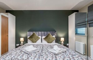 3 quartos, ferros/tábuas de passar roupa, berço de viagem, Wi-Fi