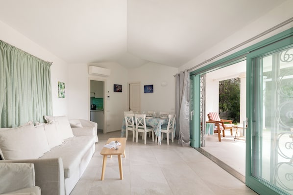 Apartment, 2 Bedrooms, Partial Sea View | Living area