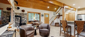 Big Fork rustic loft cabin with forest views, WiFi, 5 miles to Flathead Lake