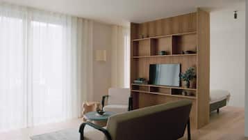 52-inch flat-screen TV with satellite channels, heated floors