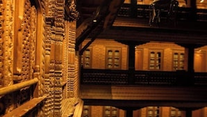 A multi-story building with ornate architectural details and a balcony. - Nagpukhu Guest House (Bhaktapur)