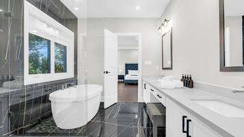 Shower, towels, soap, toilet paper