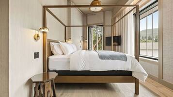 Deluxe Room, Multiple Beds, Roll-in Shower, Non Smoking | In-room safe, desk, laptop workspace, iron/ironing board