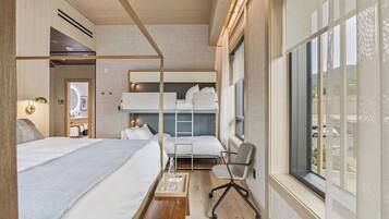 Deluxe Room, Multiple Beds, Non Smoking | In-room safe, desk, laptop workspace, iron/ironing board