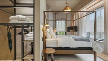 Deluxe Room, Multiple Beds, Roll-in Shower, Non Smoking | In-room safe, desk, laptop workspace, iron/ironing board