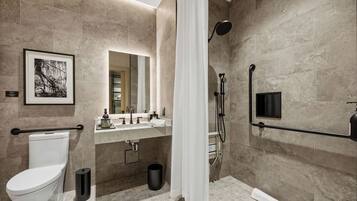 Deluxe Room, Multiple Beds, Roll-in Shower, Non Smoking | Bathroom | Shower, hair dryer, towels, soap