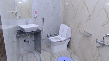 Family Quadruple Room, Balcony, Garden View | Bathroom | Shower, free toiletries, towels, soap