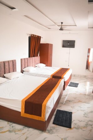 Family Quadruple Room, Balcony, Garden View | Laptop workspace, free WiFi