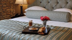 Luxury Room | Desk, laptop workspace, blackout curtains, iron/ironing board - P.A. Smith Hotel (Navasota)