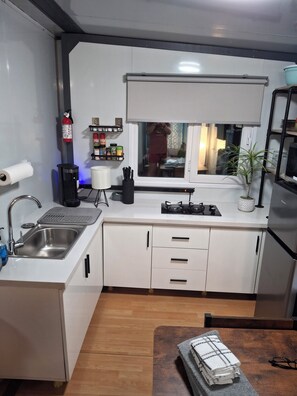 Private kitchen - The Bunker, 2 bedroom expandable container tiny house (Oak Hill)