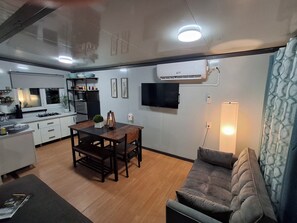 Living area - The Bunker, 2 bedroom expandable container tiny house (Oak Hill)