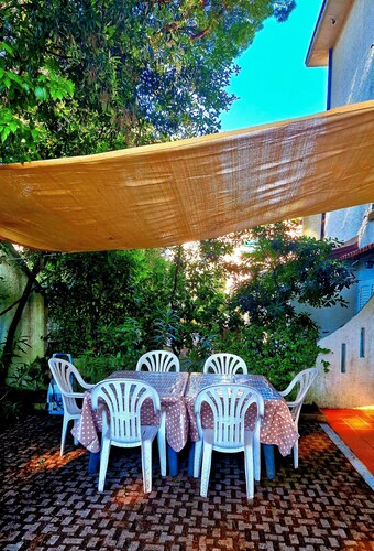 Ferienhaus 'Su 3 Piani Con Giardino' mit privatem Garten, Balkon und WLAN