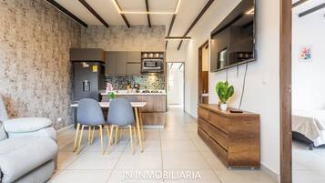 Luxury Apartment, Garden View | Living area