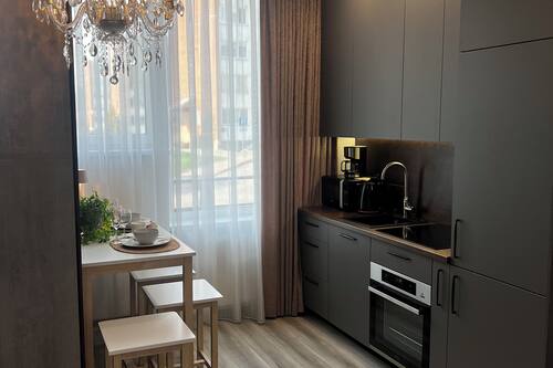 Apartament Comfort, vistes al jardí | Cortines opaques i planxa i posts de planxar