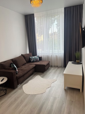 Comfort Apartment, Garden View | Blackout drapes, iron/ironing board, free wired internet