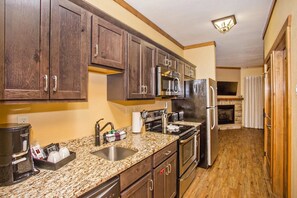 Fridge, microwave, stovetop, cookware/dishes/utensils - Mountain View Condo w/ Fireplace & Balcony (Pigeon Forge)