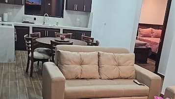 Superior Double or Twin Room, Mountain View | Living area | 55-inch flat-screen TV with cable channels